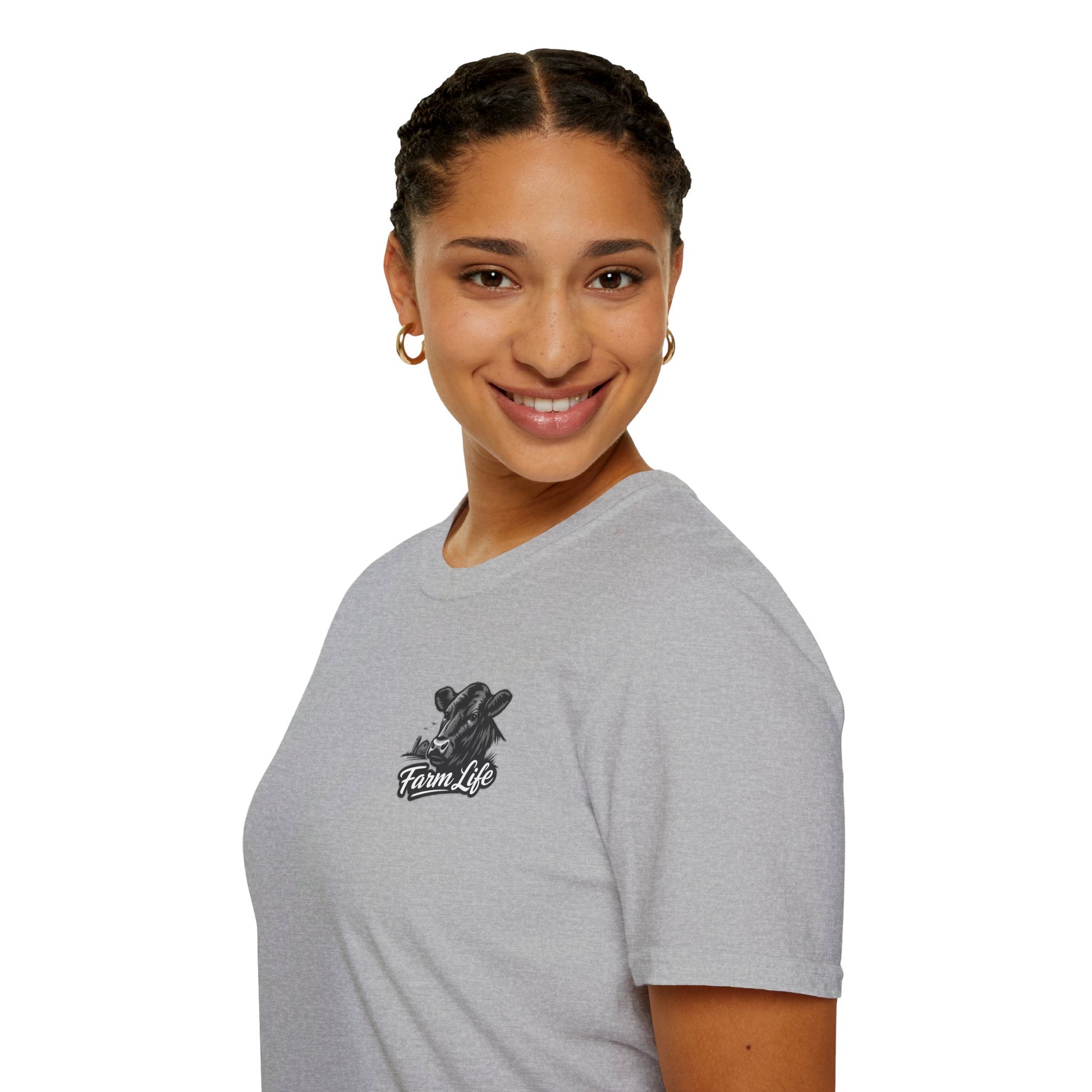 A smiling woman wearing a light gray Farm Life T-Shirt with a hand-drawn chest graphic, perfect for ranchers.