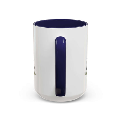 Cow Lovers Mug showing a ceramic coffee cup with a navy blue handle and cow design.