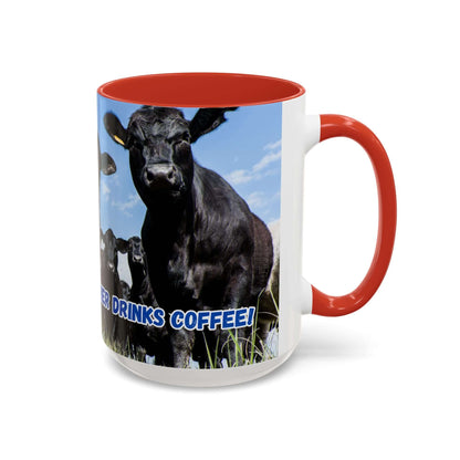 Black Angus Coffee Mug featuring a cow graphic and the phrase "Cow Drinks Coffee!" with a red handle.