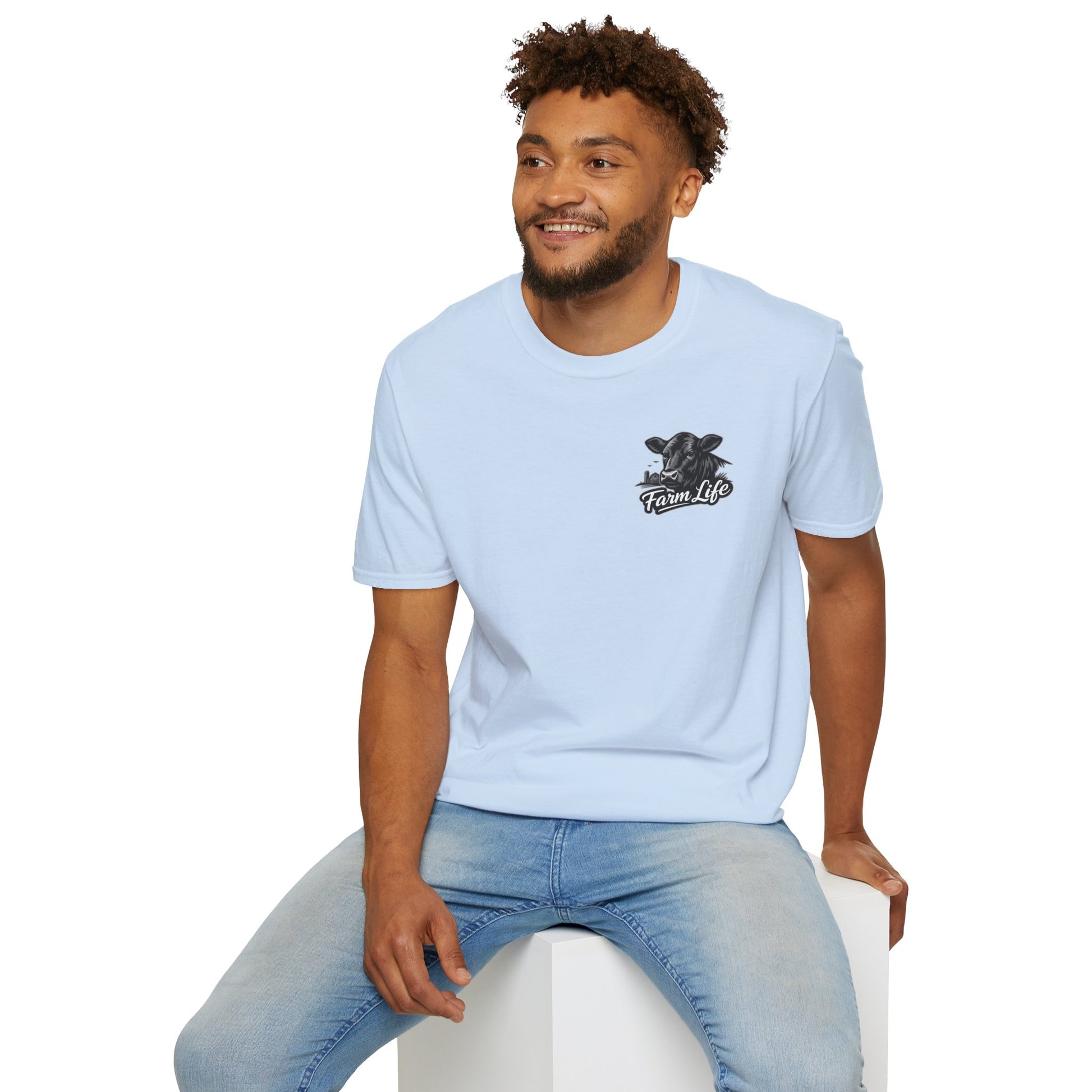 Man wearing a light blue Farm Life T-Shirt with a hand-drawn graphic, perfect for ranchers and outdoor enthusiasts.