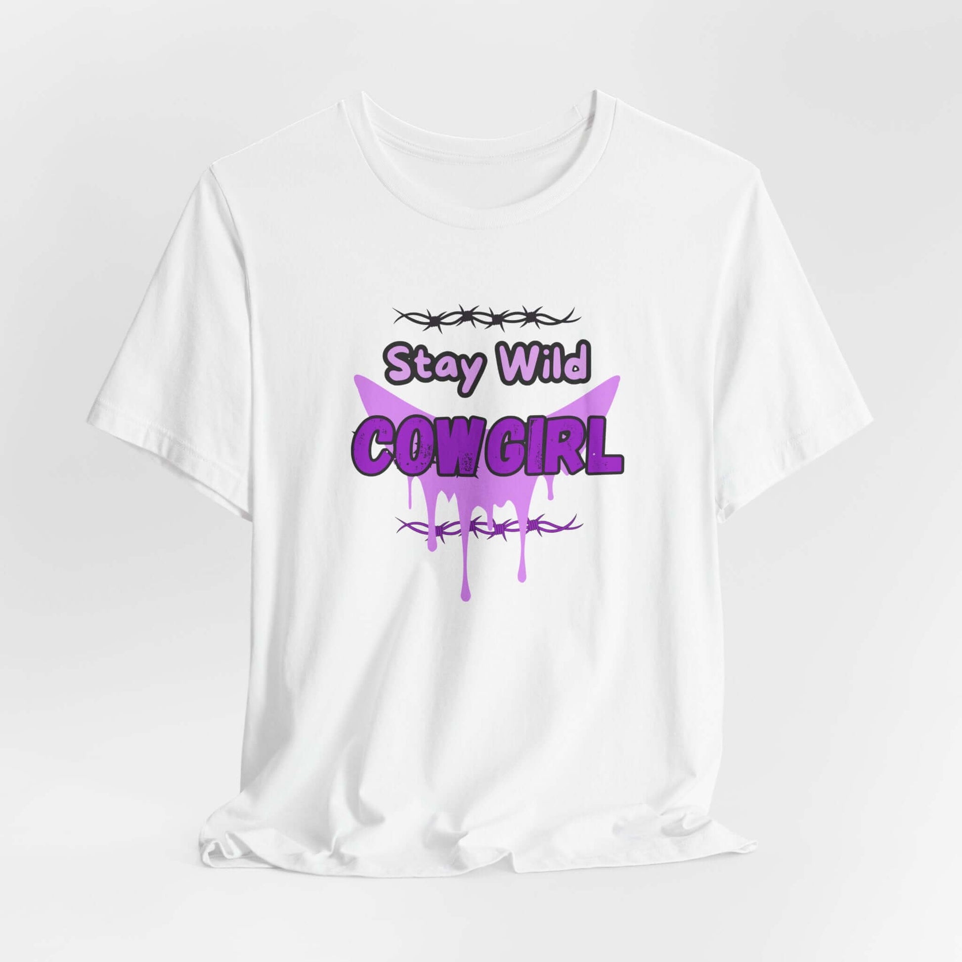 Cowgirl Western Tee featuring a purple graphic design that says 'Stay Wild COWGIRL' on a white T-shirt.