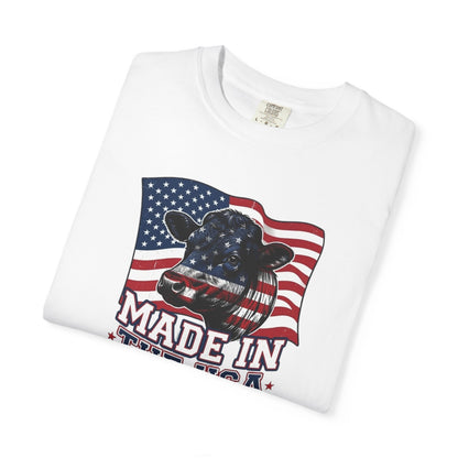 Rancher T-Shirt featuring a patriotic design with an American flag and cow graphic, made in the USA.