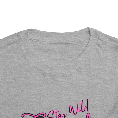 Toddler Cowgirl Tee showing soft fabric and playful 'Stay Wild Cowgirl' design for children apparel.