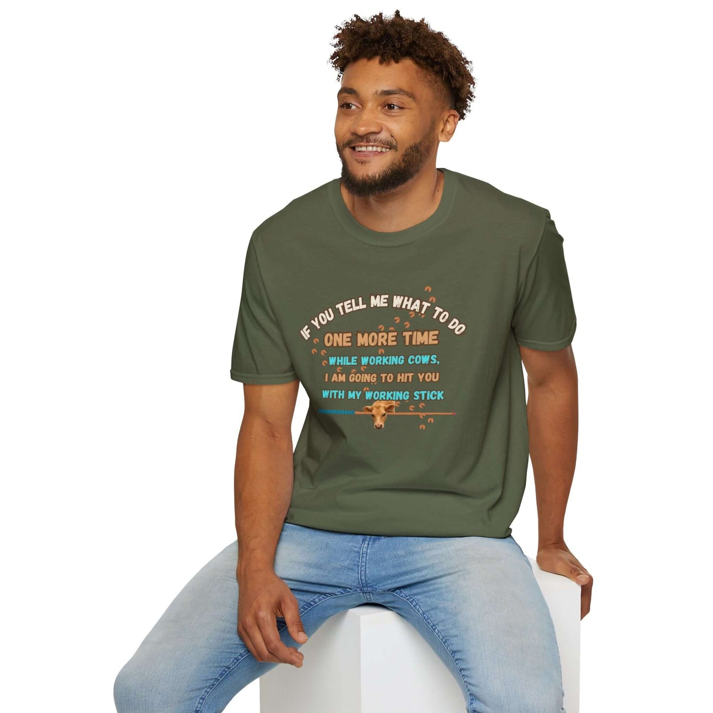 Working Cows Humor T-Shirt featuring a funny quote about cows and farming humor, worn by a smiling man.