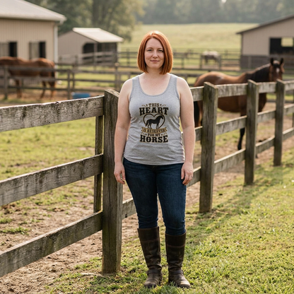 Woman wearing a Horse Lover Tank Top in a farm setting with horses in the background.