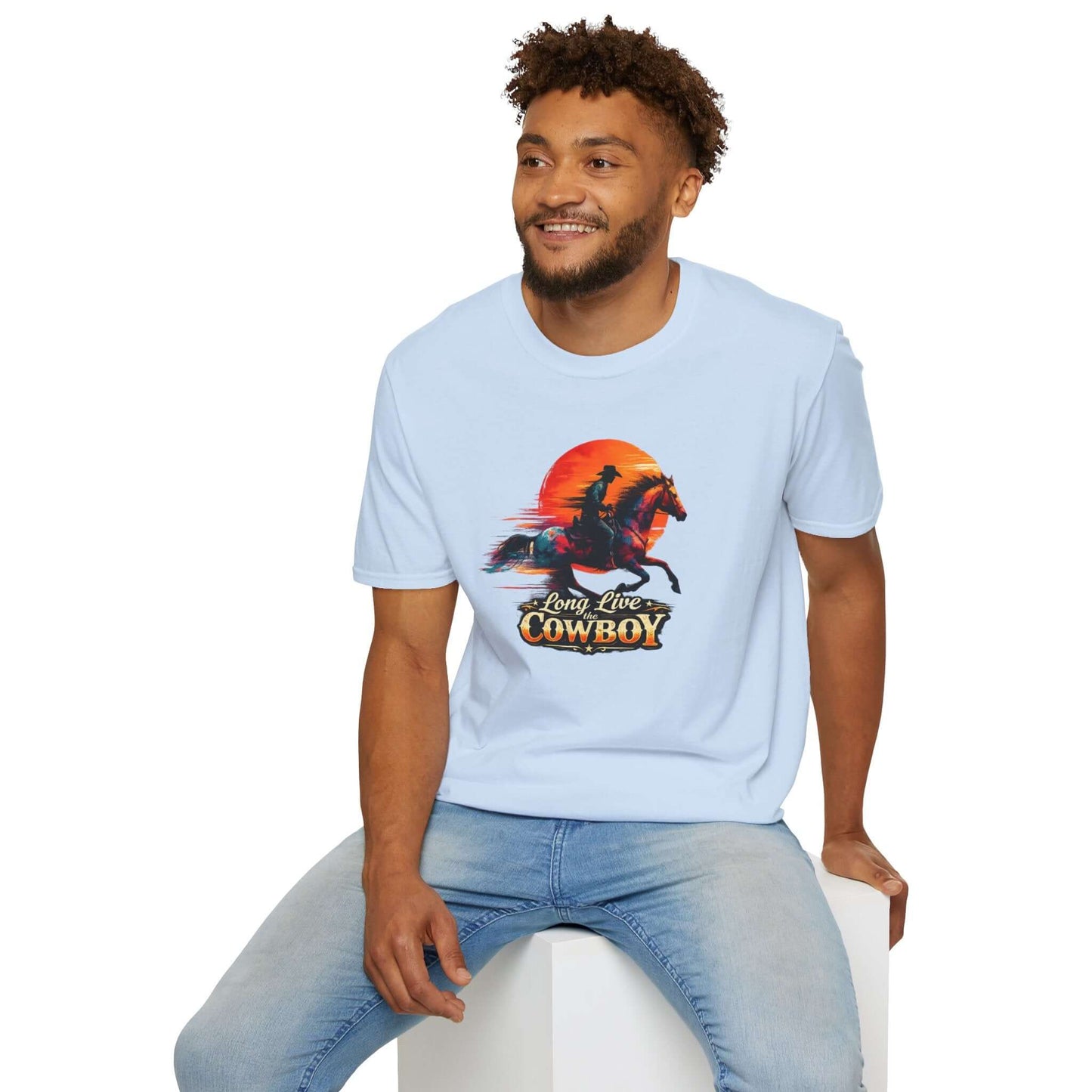 Man wearing a light blue Long Live the Cowboy T-Shirt featuring a horse silhouette and western lettering.
