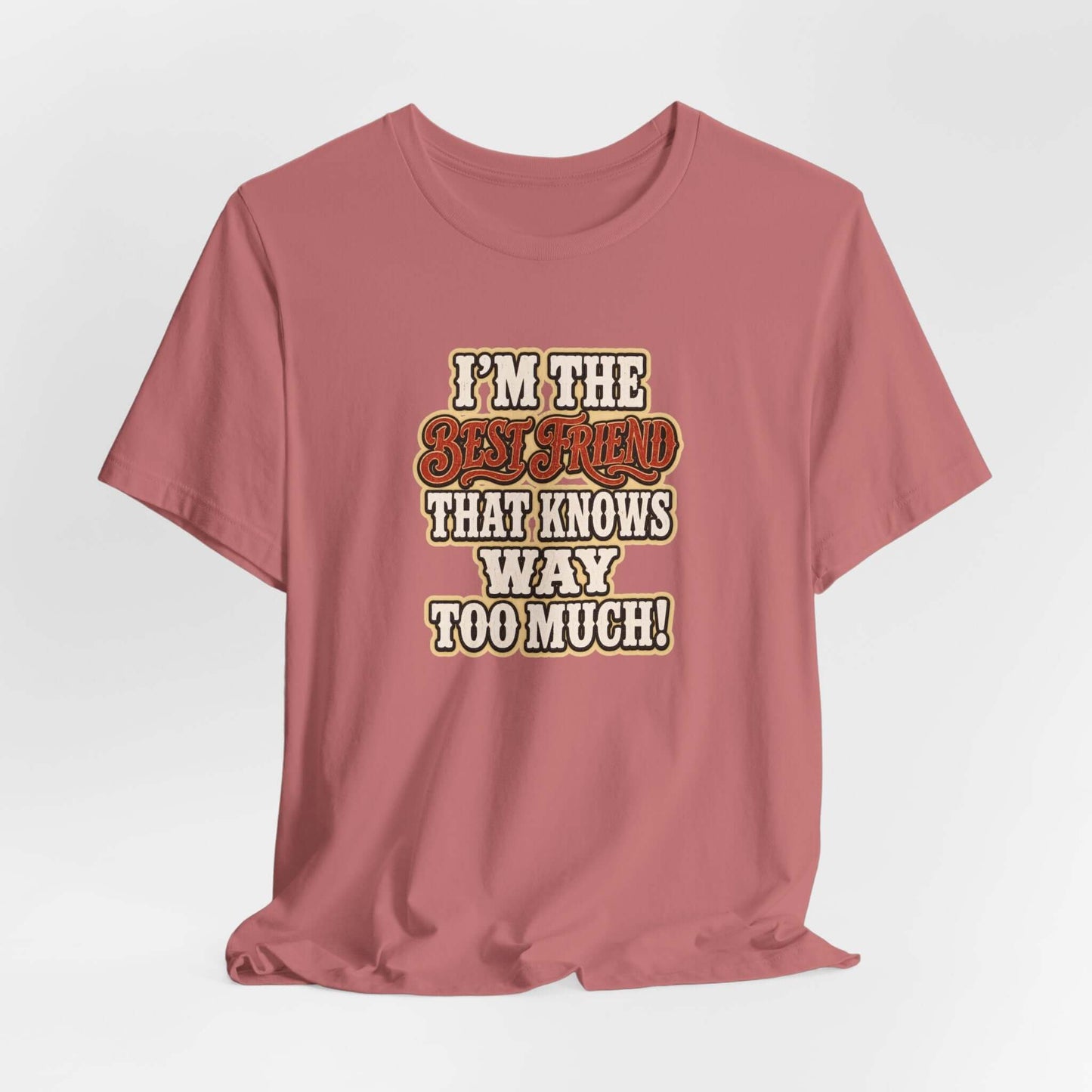 Best Friend T-Shirt featuring humorous text "I'm the Best Friend That Knows Way Too Much" on a pink cotton tee.