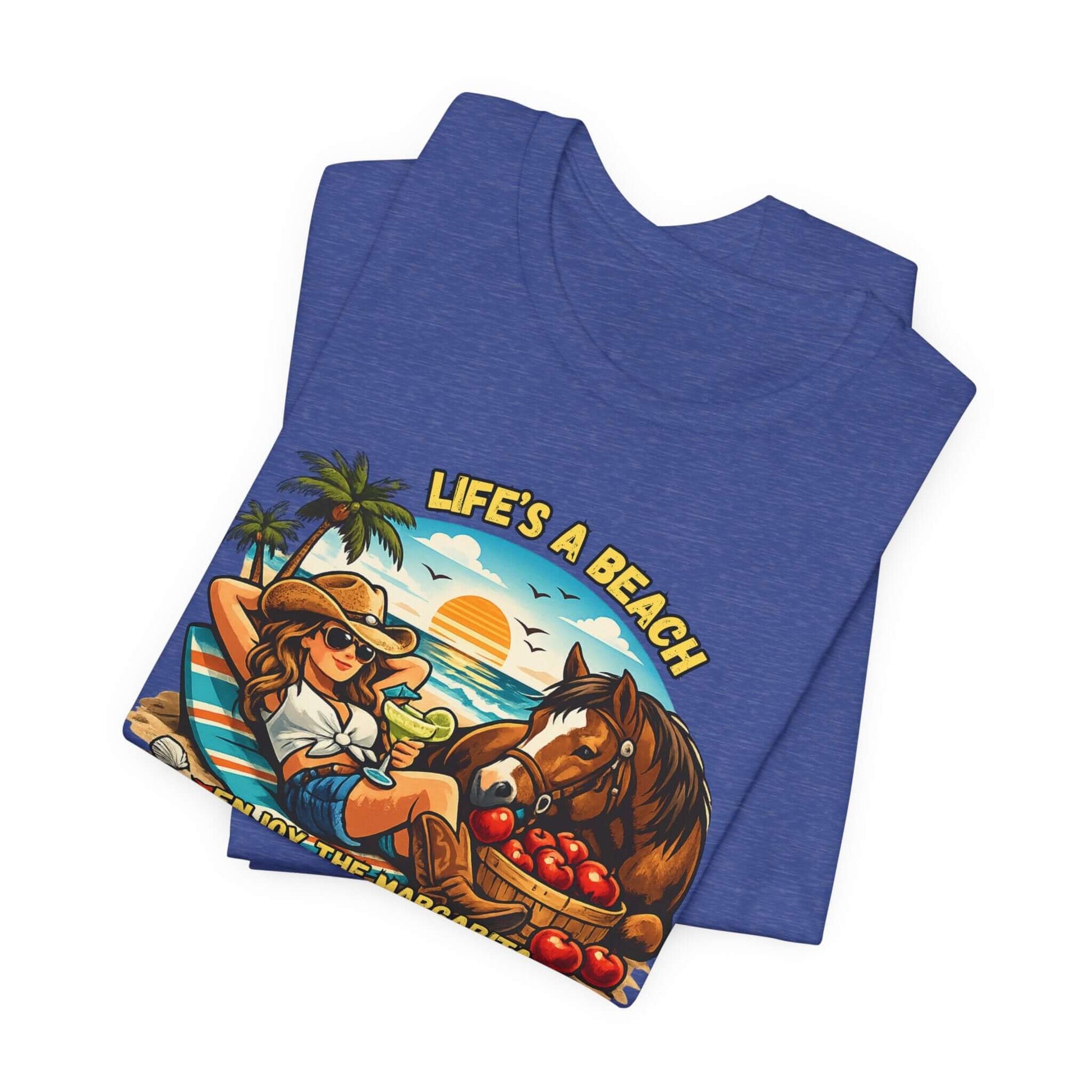 Blue Life's A Beach Western Tee with a graphic of a cowgirl and horse, perfect for beach lovers and western humor.
