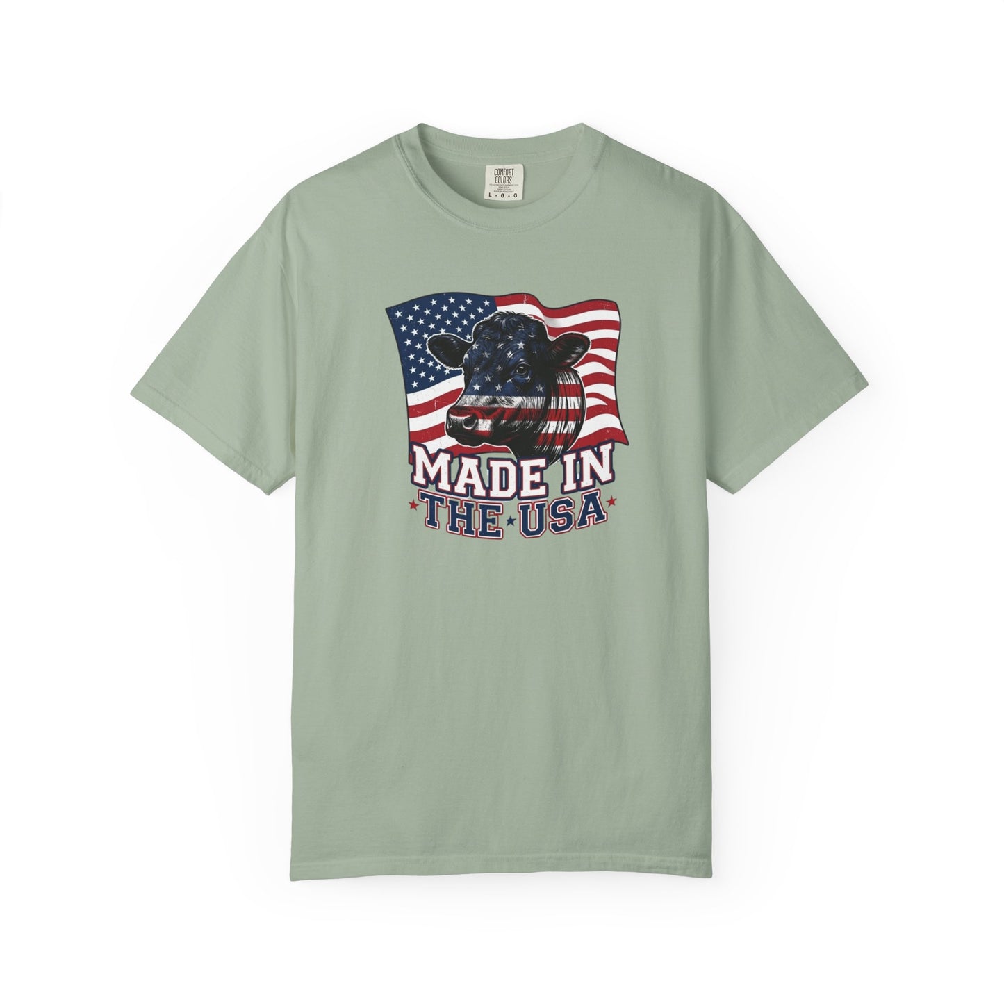 Rancher T-Shirt featuring cow graphic and American flag, made in the USA, patriotic apparel for casual wear.