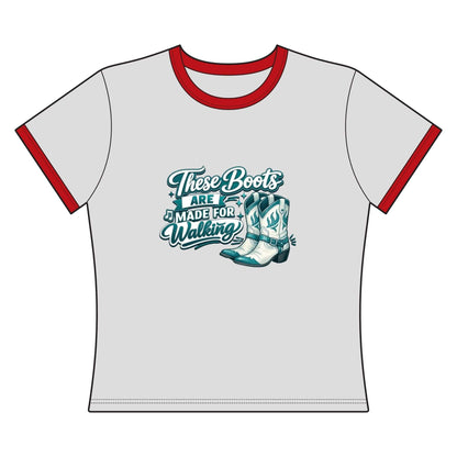 Cowgirl Cropped Tee featuring a graphic of cowboy boots and the phrase "These Boots Are Made For Walking" in teal.