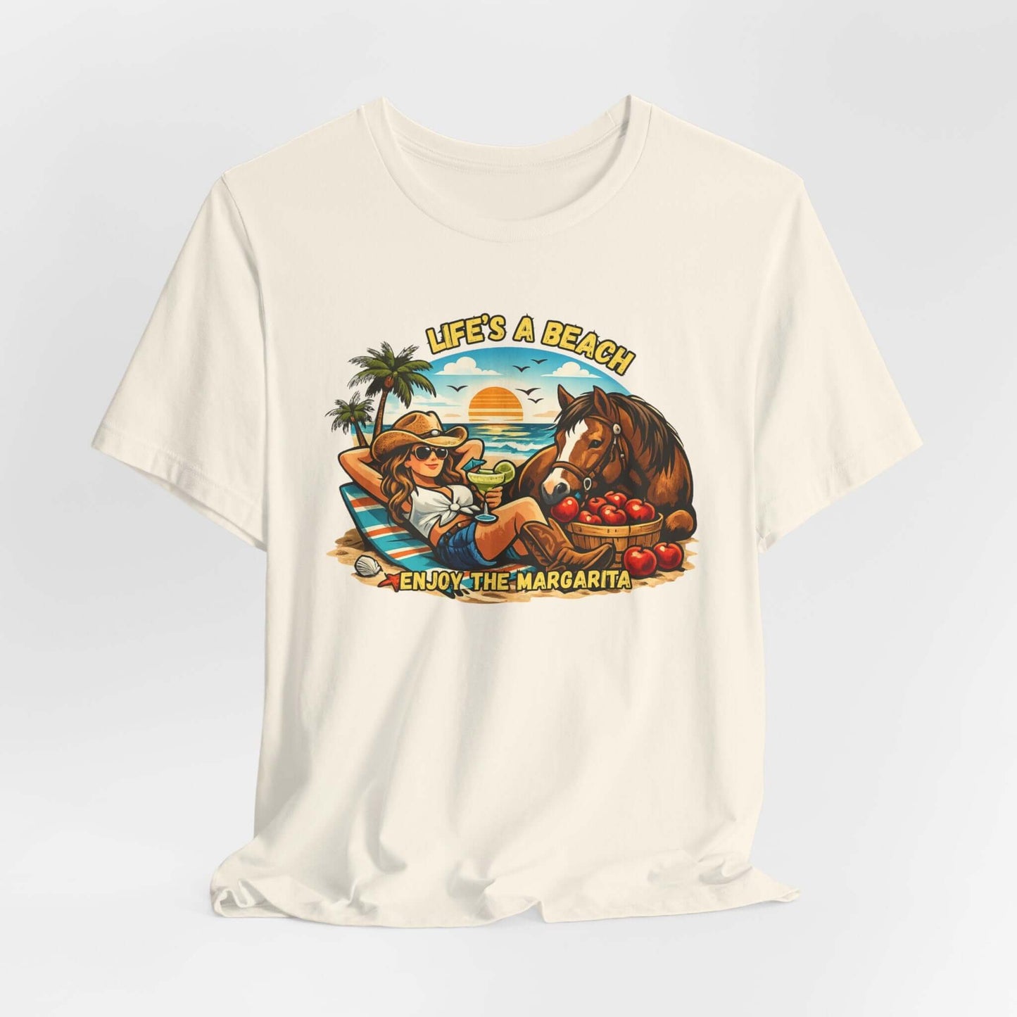 Life's A Beach Western Tee featuring a girl enjoying a margarita with a horse, palm trees, and sunset in a fun design.