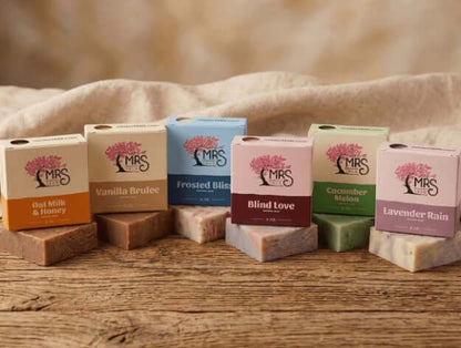 Real Soap bars in various scents, including Oat Milk & Honey and Lavender Rain, perfect for homemade gifts.