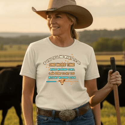 Working Cows Humor T-Shirt featuring humorous text about working cows, worn by a woman in a rural setting.