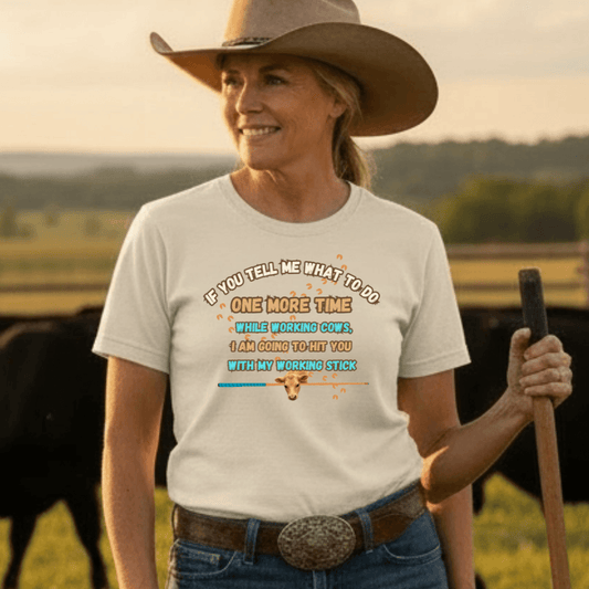 Working Cows Humor T-Shirt featuring humorous text about working cows, worn by a woman in a rural setting.