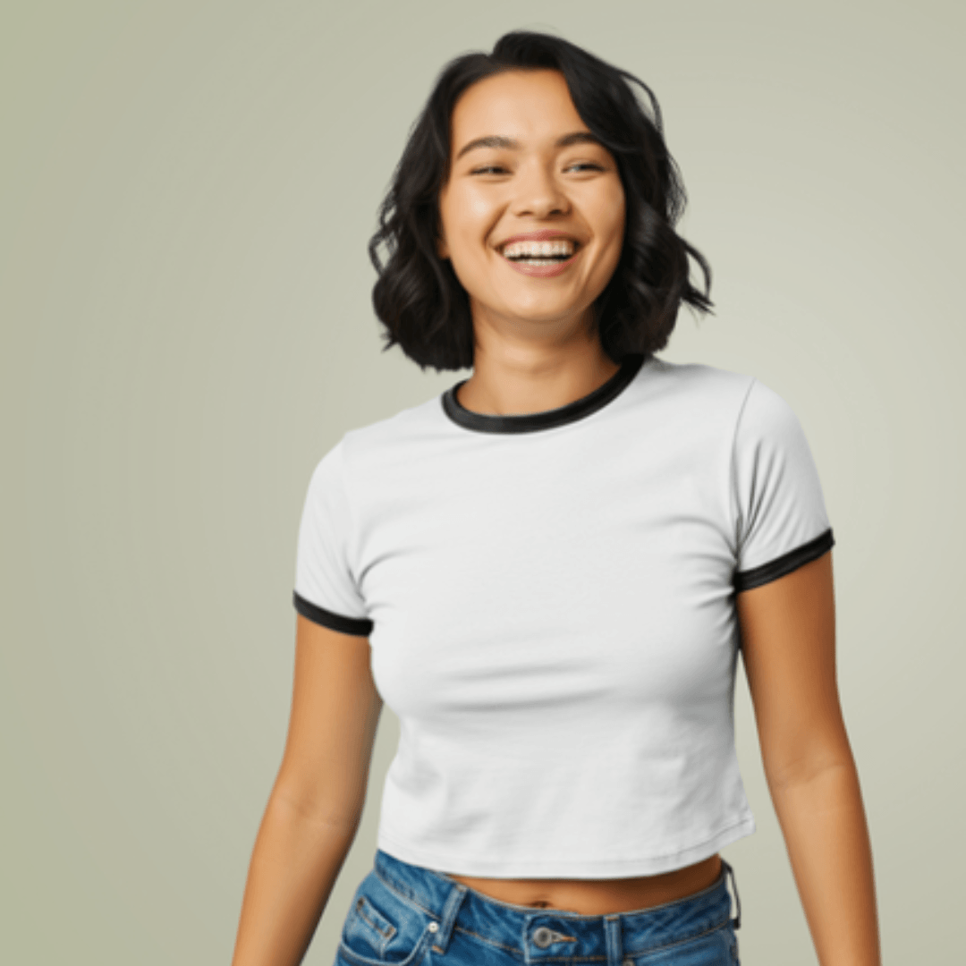 Cowgirl Cropped Tee model smiling in a casual outfit with a vintage touch and body-hugging fit.