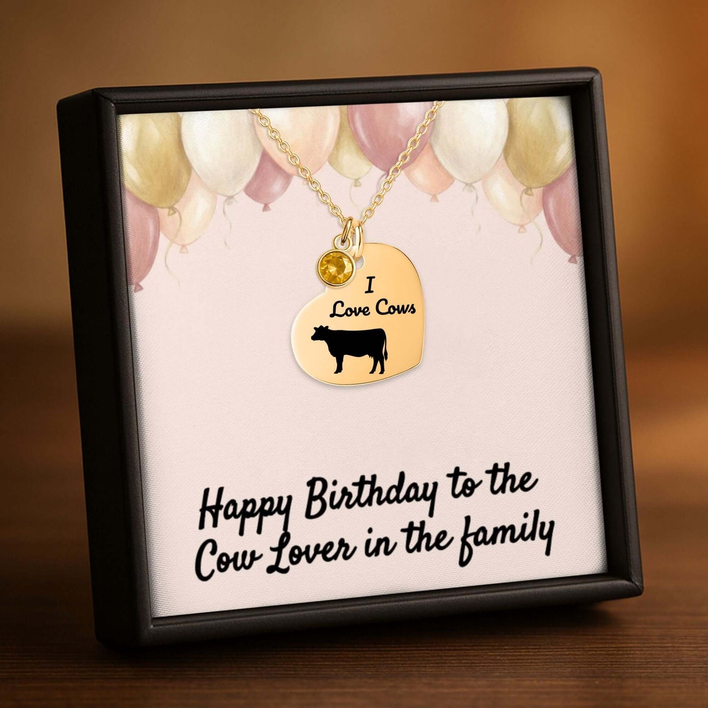 Engraved I Love Cows Heart Necklace displayed in a gift box with a birthday message for cow lovers.