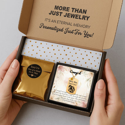 Personalized Cowgirl Tag Necklace gift box containing a necklace, message card, and packaging with golden accents.