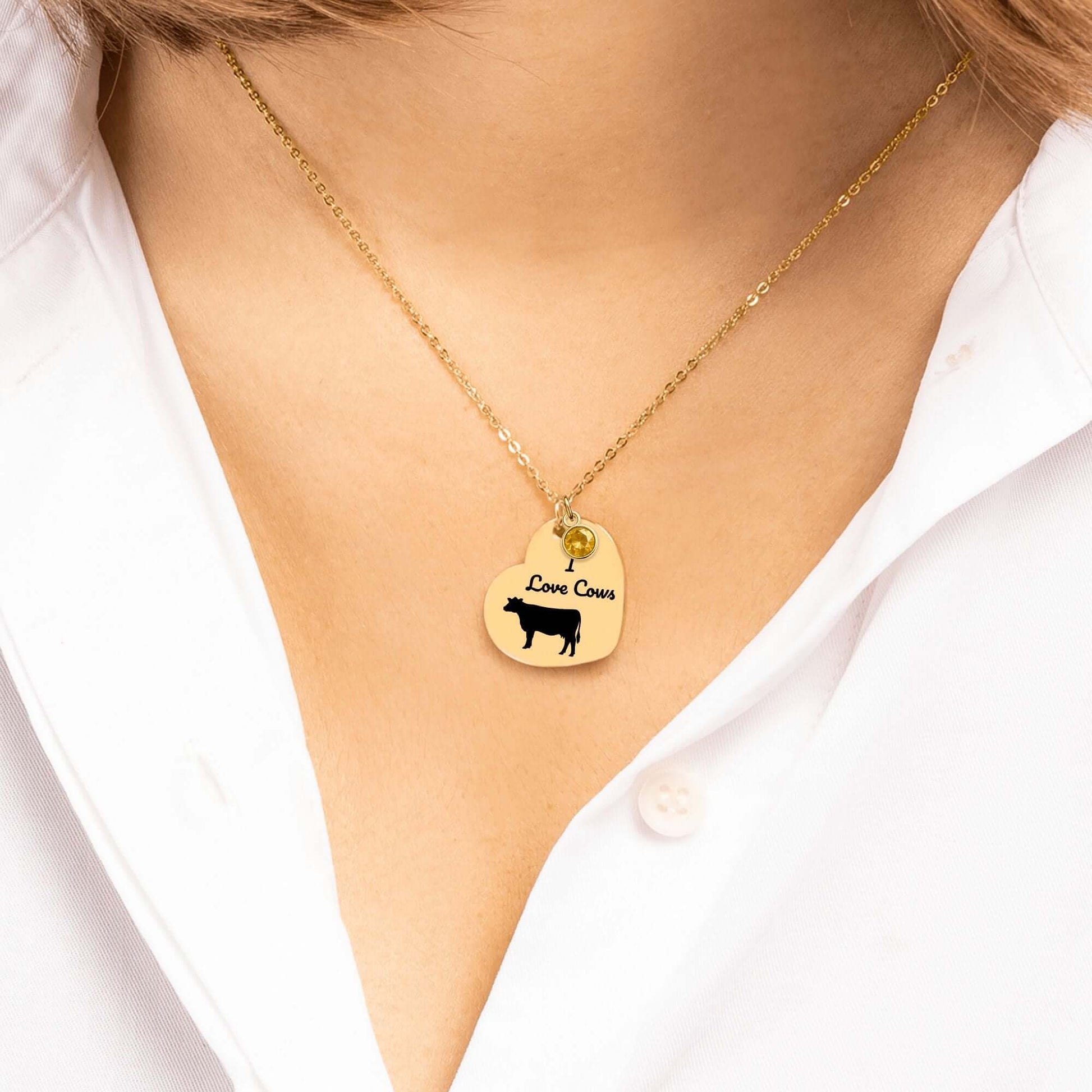 Engraved I Love Cows Heart Necklace, showing a gold necklace with a heart pendant and cow design.