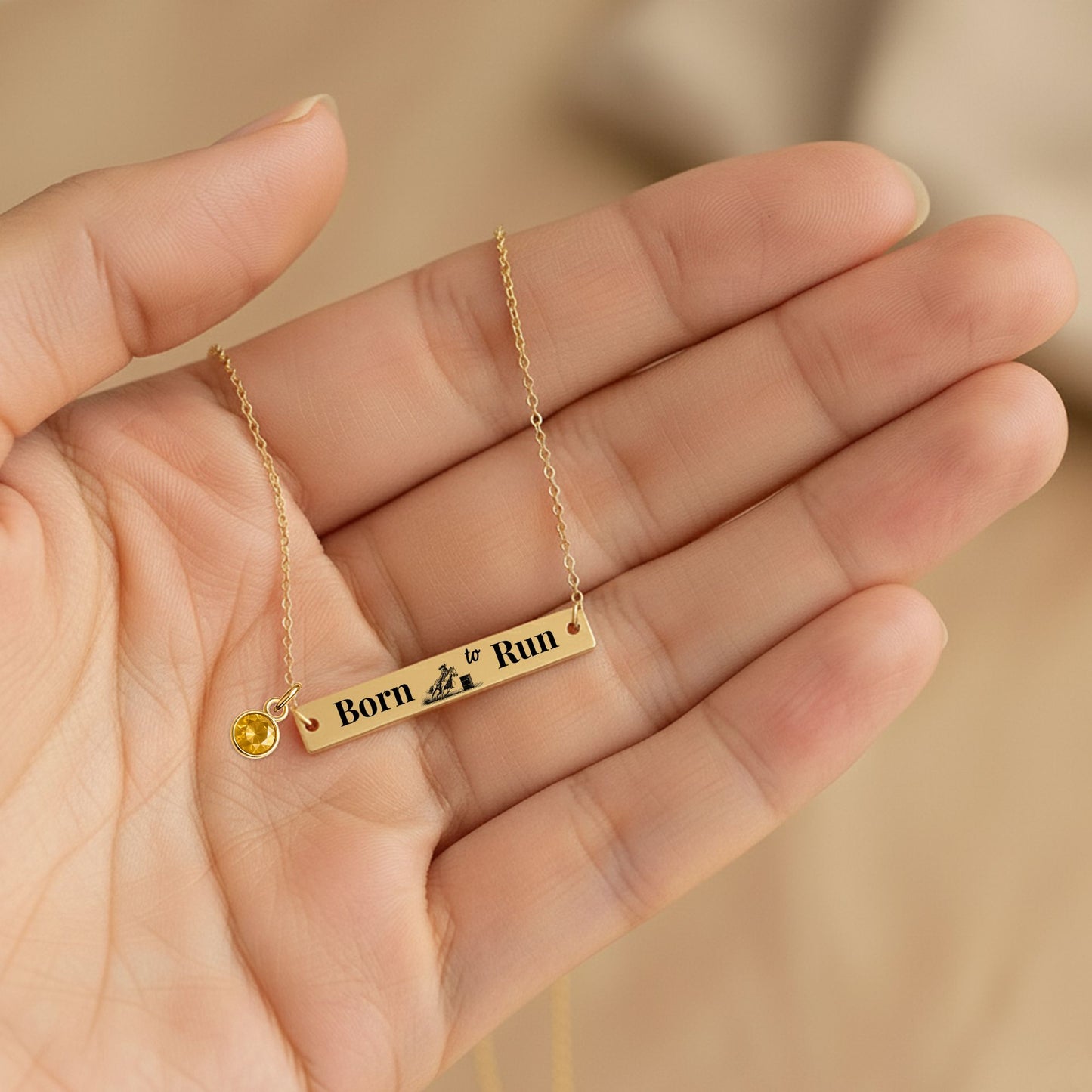 Barrel Racer Horizontal Bar Necklace featuring the engraved message 'Born to Run' and a birthstone charm.