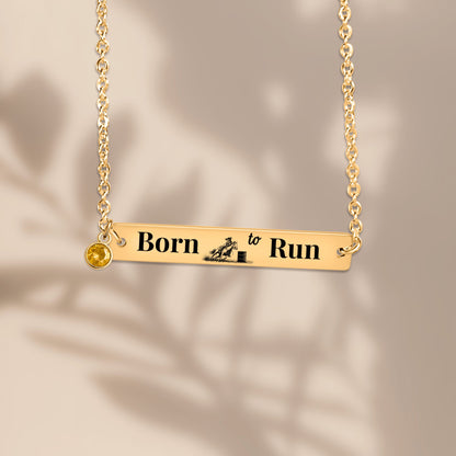 Barrel Racer Horizontal Bar Necklace with "Born to Run" engraving and birthstone charm in gold.