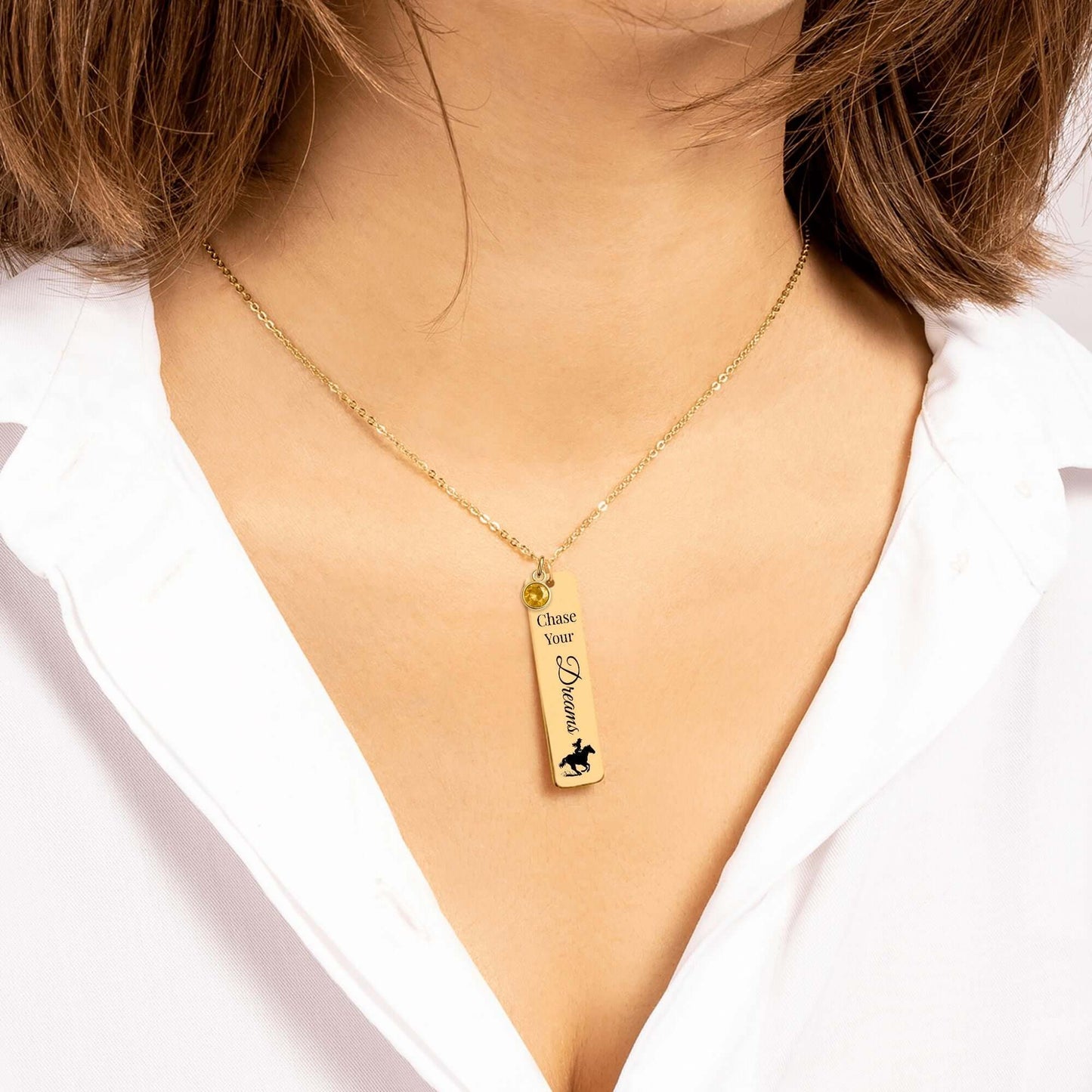 Chase Your Dreams Vertical Bar Necklace featuring customizable design and gold finish worn by a woman.